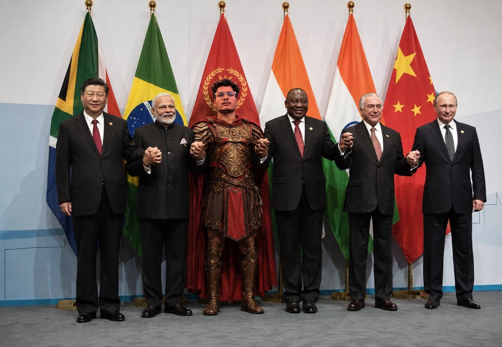 me in roman armor photoshopped into a world leaders summit photo